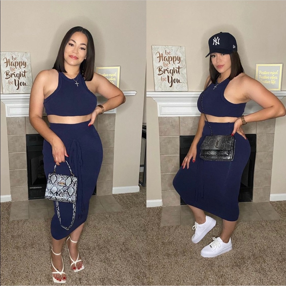 Navy blue knit two piece skirt set.